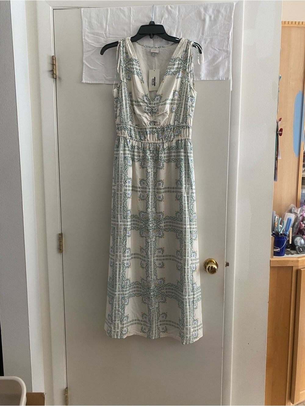 A new day. Sleeveless Cream Maxi Dress with green Pattern. NWT